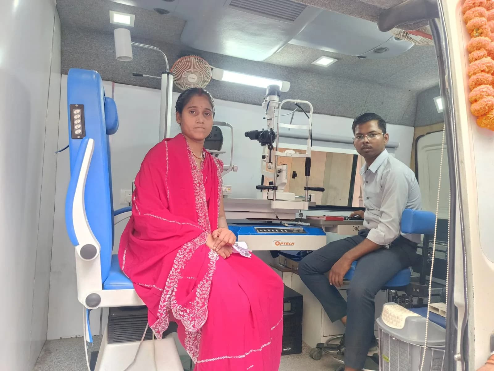 A resident in the examination chair of the Saksham mobile eye clinic